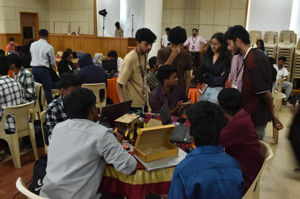 Participants gathered around a hardware build at Makeathon 2026